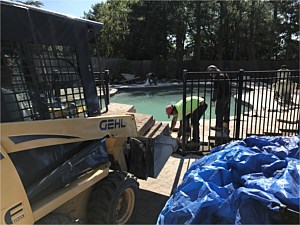 free form kidney shaped brick pool patio